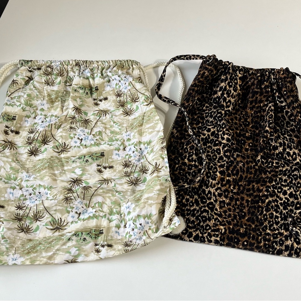 Pair of lightweight cloth, backpacks, new condition.